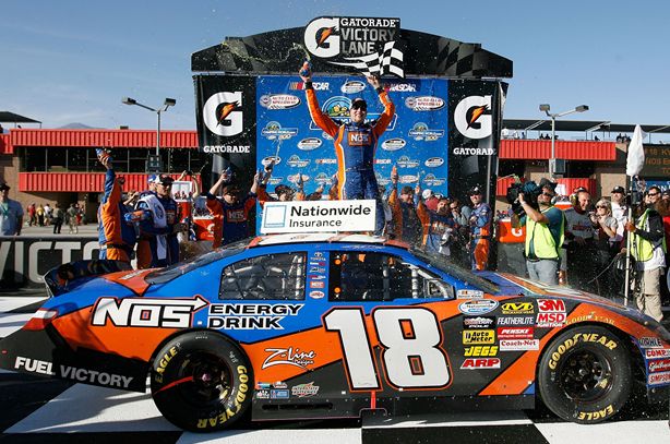 Kyle Busch celebrates his fourth NASCAR Nationwide Series win at Auto Club Speedway on Saturday in Fontana, Calif. Credit: Tom Pennington/Getty Images for NASCAR